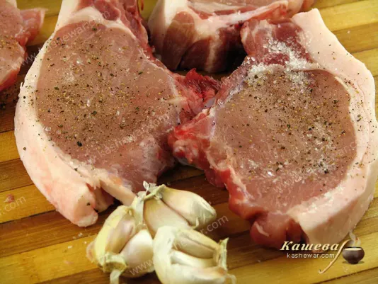 Rub the chops with salt and pepper