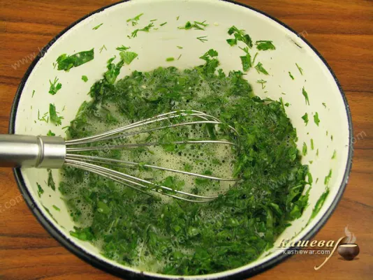 Mix eggs with herbs