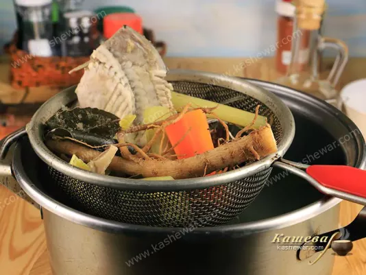 Filtering fish broth