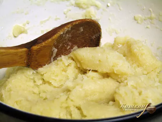 Quickly add flour and mix the dough